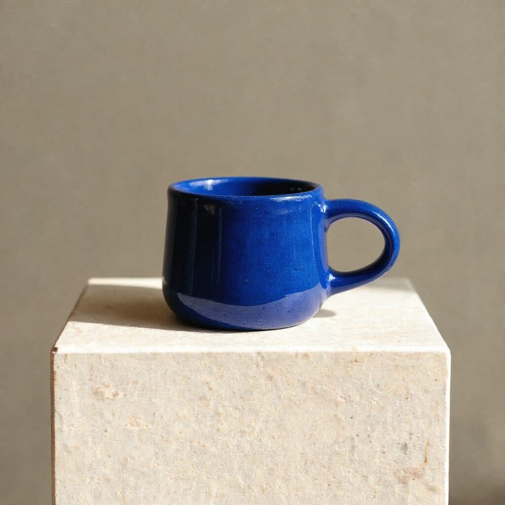 ceramic mug reglazed in cobalt blue with Flux Kontext Max in Made