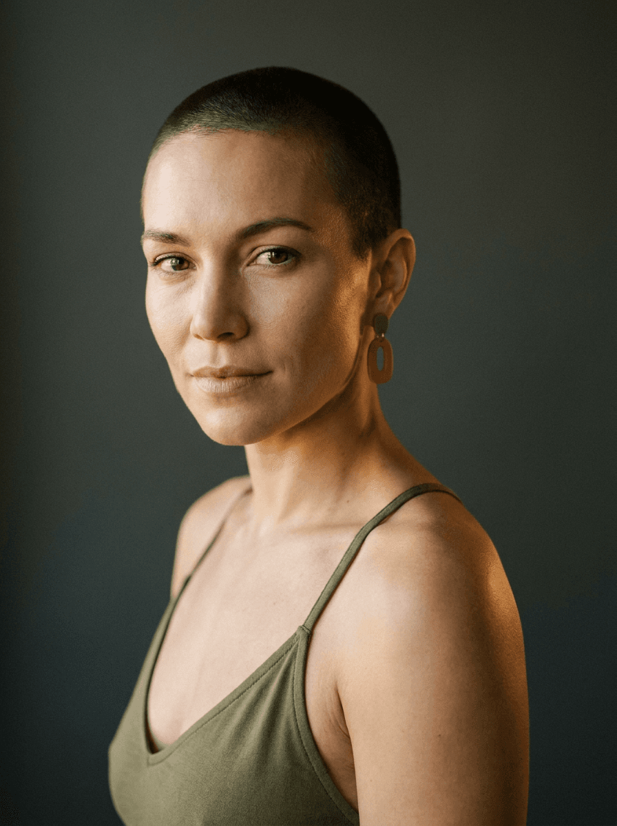 Portrait of the subject previewing a short buzz cut