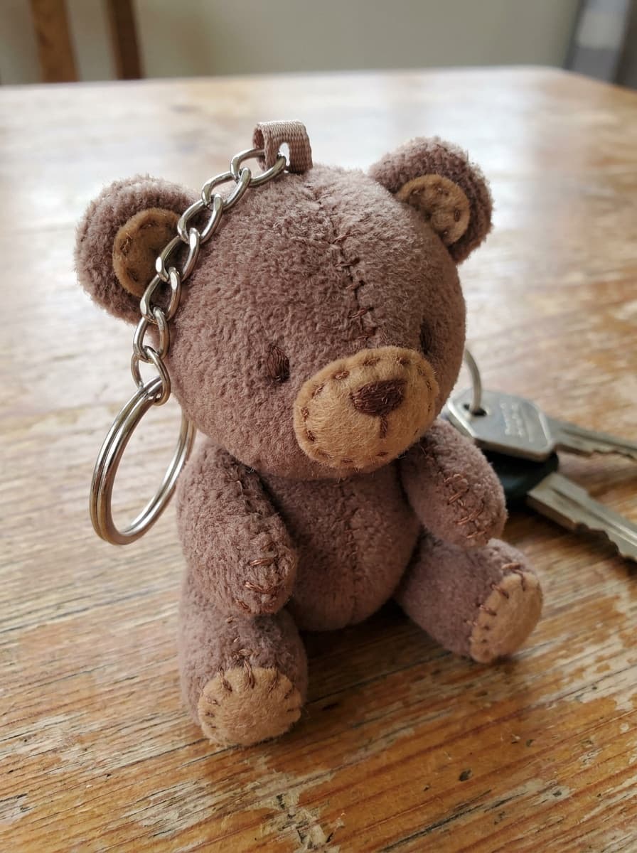 Small keychain-style plush version of a subject