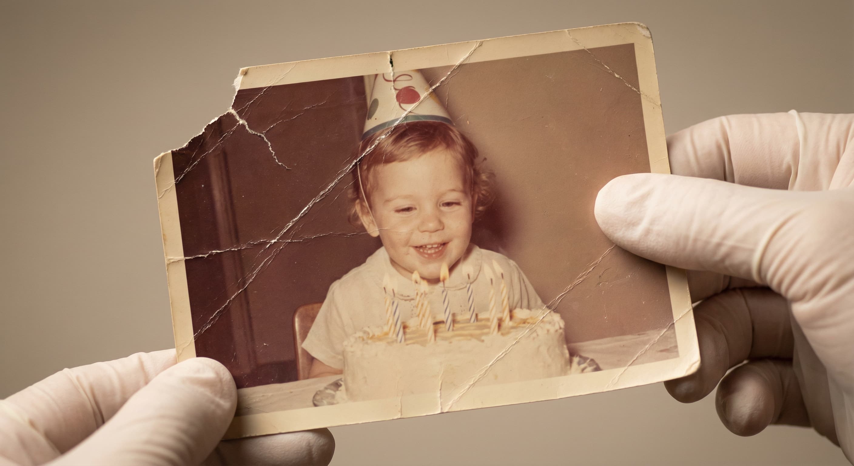 Old photograph with scratches and tears repaired