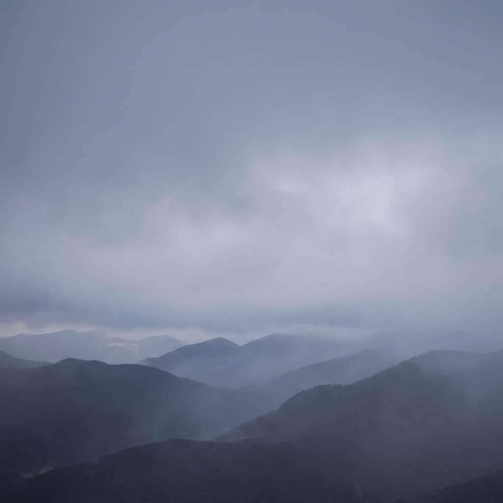 Moody misty landscape background for a reflective quote