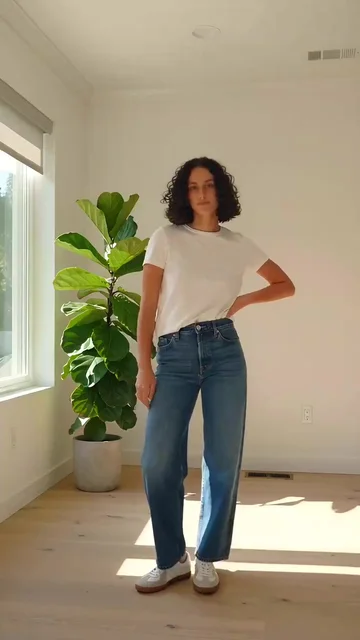 The frame as filmed: a white t-shirt and blue jeans